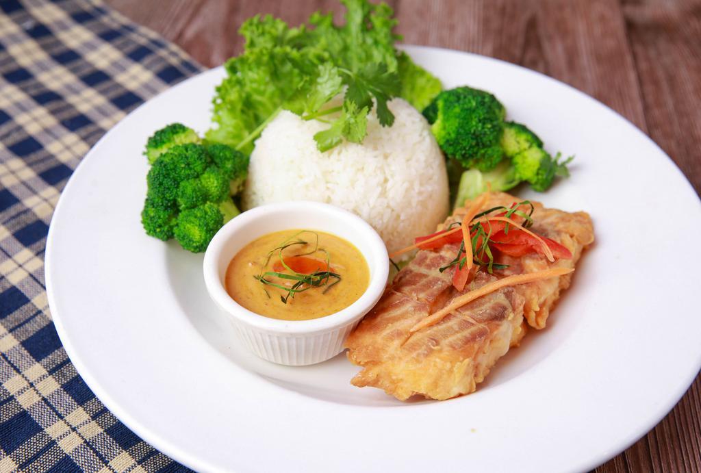 Choo Chee Salmon · Deep fried Salmon topped with red curry peanut sauce served with steamed rice