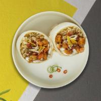 Prawn Brawn Burrito · 12 shrimp pieces, rice, beans, Mexican salsa, onion, and cilantro.