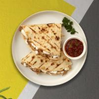 The Castle's Quesadilla · A big flour tortilla with melted cheese, any meat, avocado, sour cream, jalapenos, and sauce.