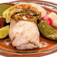 Regular Burrito · Our regular burrito, a warm flour tortilla filled with your choice of meat, rice, beans, let...
