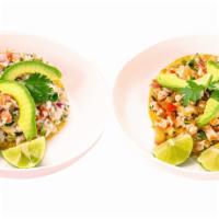 2 Tostadas De Ceviche · Since no one likes a soggy tostada, we give you 2 servings of ceviche along with 2 tostadas ...