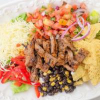 Grilled Marinated Steak Salad · All salads come with organic mixed lettuce, bell pepper, black beans, corn, jicama, shredded...