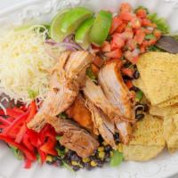 Slow Roasted Pork Salad · All salads come with organic mixed lettuce, bell pepper, black beans, corn, jicama, shredded...