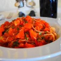 Capellini Alla Cecca · Fresh diced tomatoes, garlic & basil marinara sauce.