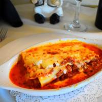 Lasagne al Forno · Baked lasagna with Italian sausage meat sauce.