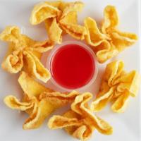 Crab Rangoon · 6 pieces of Crab rangoon deep fried with sweet and sour sauce on side.
contain cream cheese ...