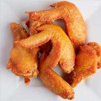 5 Piece Fried Chicken Wings · Cooked wings of a chicken coated in sauce or seasoning.