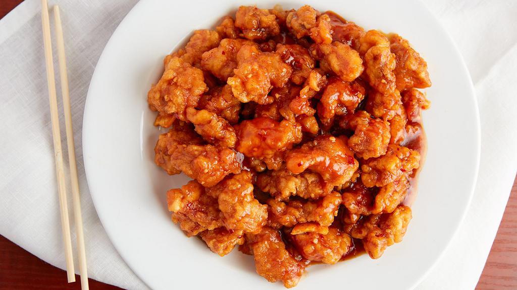 Orange Chicken Plate Combo · Chicken battered and cooked in a sweet orange sauce. Hot and spicy.