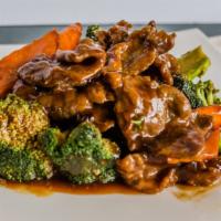 Beef With Broccoli · Served with white rice. Carne con broccoli.