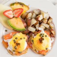 Salmon Benedict · Poached eggs, smoked salmon, red onion, capers on English muffin topped with hollandaise.