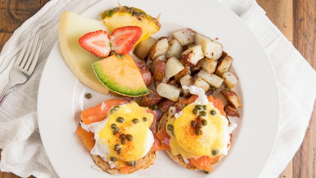 Salmon Benedict · Poached eggs, smoked salmon, red onion, capers on English muffin topped with hollandaise.