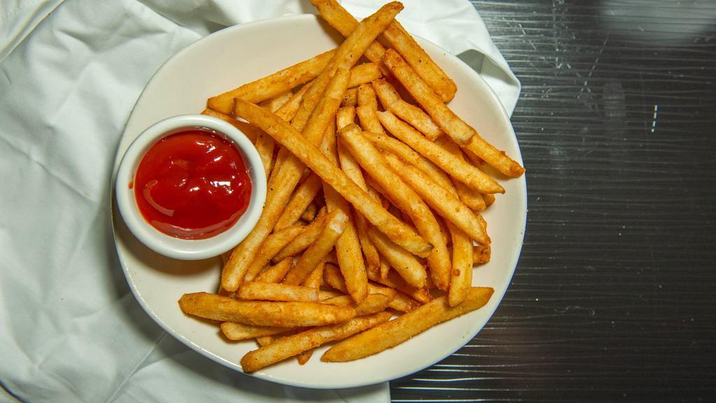 Garlic Fries · Classic cut fries, garlic, and parsley.