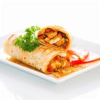 Halal Chicken Kabob Wrap · Tender marinated ground chicken charbroiled on a skewer then pulled onto lavash bread with l...