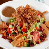 Lentil Protein Bowl · Romaine & cabbage, tossed with radishes, tomatoes, carrots, cucumbers, fresh pomegranate see...