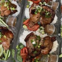 46.Grilled Marinated  Chicken Over Rice / Cơm Gả Nướng · Grilled Marinated  chicken over steamed rice and vegetable.