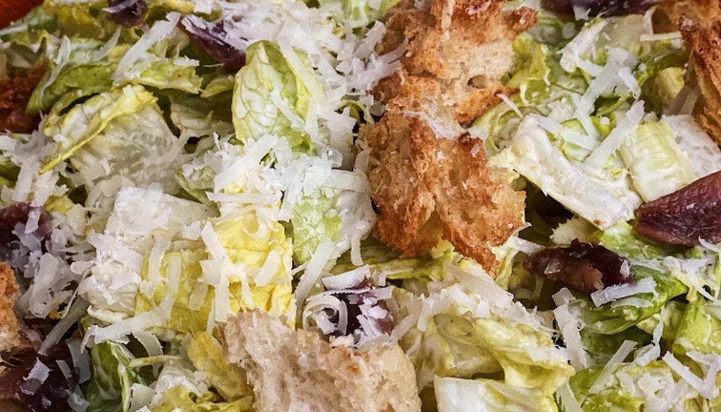 Caesar Salad · Romaine, croutons, anchovies & grana padano.