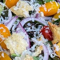 Garden Salad · Mixed greens, red onion, tomatoes and croutons and Parmesan.