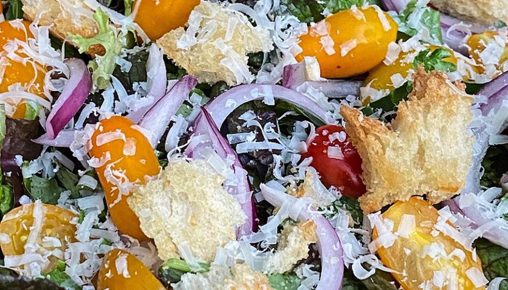Garden Salad · Mixed greens, red onion, tomatoes and croutons and Parmesan.