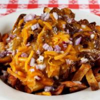 Chili Cheese Fries · BBQ fries smothered in minnie's Texas beef brisket chili and sharp cheddar cheese.