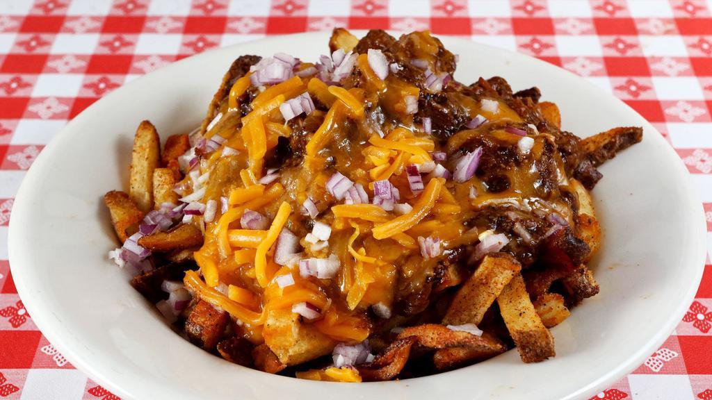 Chili Cheese Fries · BBQ fries smothered in minnie's Texas beef brisket chili and sharp cheddar cheese.