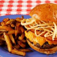The Maxi Burger · We grind our own blend of chuck and beef brisket, topped with pimento cheese, crispy onion s...
