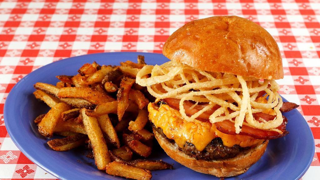 Minnie's Maxi Burger (Friday) · Friday special! A mix of chuck and brisket, freshly ground in-house and grilled to your liking. Topped with house-made pimiento cheese, minnie's own house cured and smoked bacon and crispy fried onion strings. Served with fries or your choice of side.
