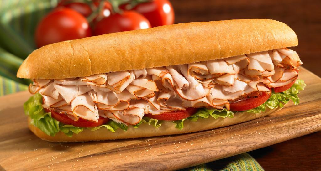 Turkey Breast · Made with fresh, shaved Boar's Head turkey breast with lettuce, tomato and oregano served on a genuine Amoroso roll imported from Philadelphia.