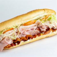 Philly Club · Made with fresh, shaved Boar's Head ham & turkey breast with crisp bacon, lettuce, tomato an...