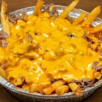 Cheesesteak Fries · French fries topped with thinly sliced Steak & Wiz.