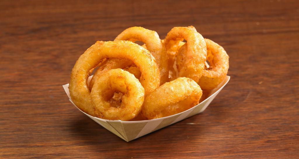 Onion Rings · Thick cut, beer-battered onion rings.