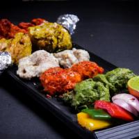 Tandoori Mix Platter · Combination of ChickenTikka, Shrimp and Lamb Kebab