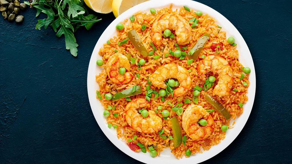 FB's Shrimp Biryani · Shrimp Biryani is a spicy and delicate, full-flavored meal, made with fragrant basmati rice and shrimp. The warm flavors of fresh spices, turmeric, red chili powder and the sweetness from onions cooked in ghee make this an ultimate dish for lunch or dinner!