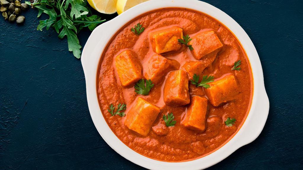 Chicken Tikka Masala · Boneless Chicken cooked in Creamy Tomato sauce with coriander and House Special Spices.