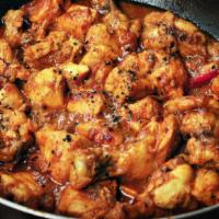 Pepper Chicken · Boneless Chicken Pieces cooked with Onion Sauce, Fresh Bell Peppers and Mixed Spices
