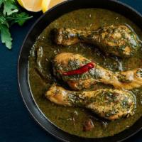 Saag Chicken Curry · Saag Chicken is a warm, savory mix of finely chopped, soft spinach, spices, cream; and chick...