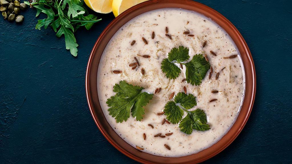 Raita (8 oz) · A simple authentic Raita an Indian yogurt sauce with cucumber, mint and cilantro.