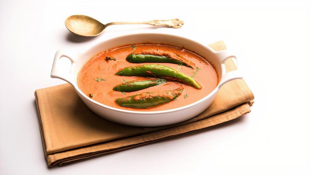 Salan · Mirchi ka salan is a lightly spiced, creamy & slightly tangy curry made with green chilies.