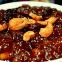 Qubani Ka Meetha · Traditional Hyderabadi Dessert made with Dried Apricots and Garnished with Nuts and served c...