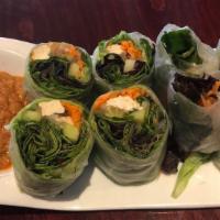 Fresh Shrimp Rolls · Mixed vegetables, avocado, shrimp, and rice noodles, wrapped in rice paper, and served with ...