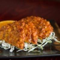 Thai Corn Cakes · Deep-Fried Combination of corn fritters and curry paste, served with sweet chili sauce and t...