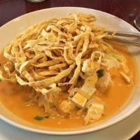 Khao Sawy · One of Chiang Mai's well known dishes, boiled egg noodles, chicken, tofu, and crispy noodles...