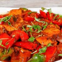 Chicken Karahi · Tender chicken breast cooked with tomatoes, bell pepper, onions and blend of special spices.