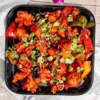 Gobi Manchurian · Cauliflower pieces dipped in corn batter and fried with soy sauce, tomatoes, chilies and gar...