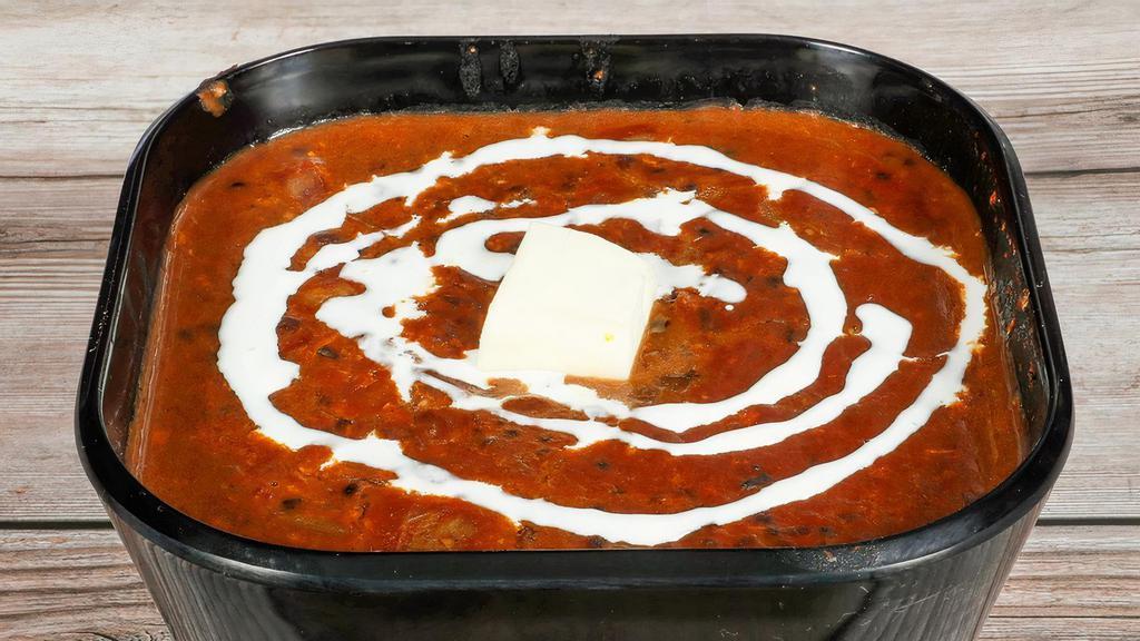 Dal Makhani · Hearty lentils stew with fresh spices.