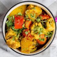 Mix Vegetable Curry · Mix Vegetables cooked in a light curry sauce.
