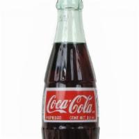 Mexican Coke Coca Cola · It's here from Mexico! Mexican Coke Coca Cola made with real pure cane sugar it is quite good.