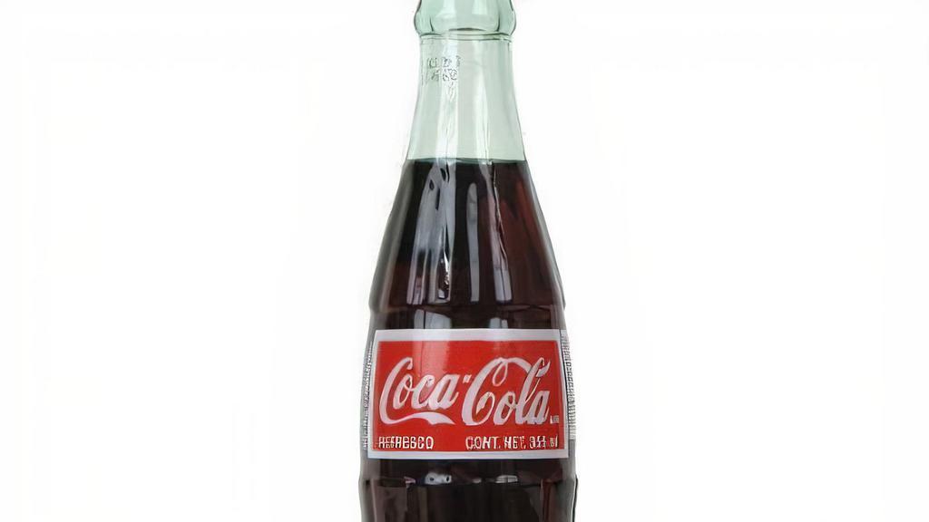 Mexican Coke Coca Cola · It's here from Mexico! Mexican Coke Coca Cola made with real pure cane sugar it is quite good.