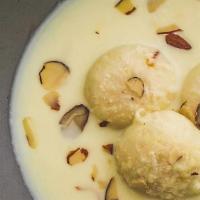 Ras Malai · Soft cottage cheese soaked in sweetened thick milk.