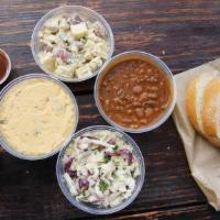Sides - Al La Carte - Half Pint · Choice of beans, corn, coleslaw, mac n cheese, or potato salad. Served in half pint containe...