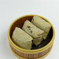 Sticky Rice & Chicken in Lotus Leaf Wrap · 